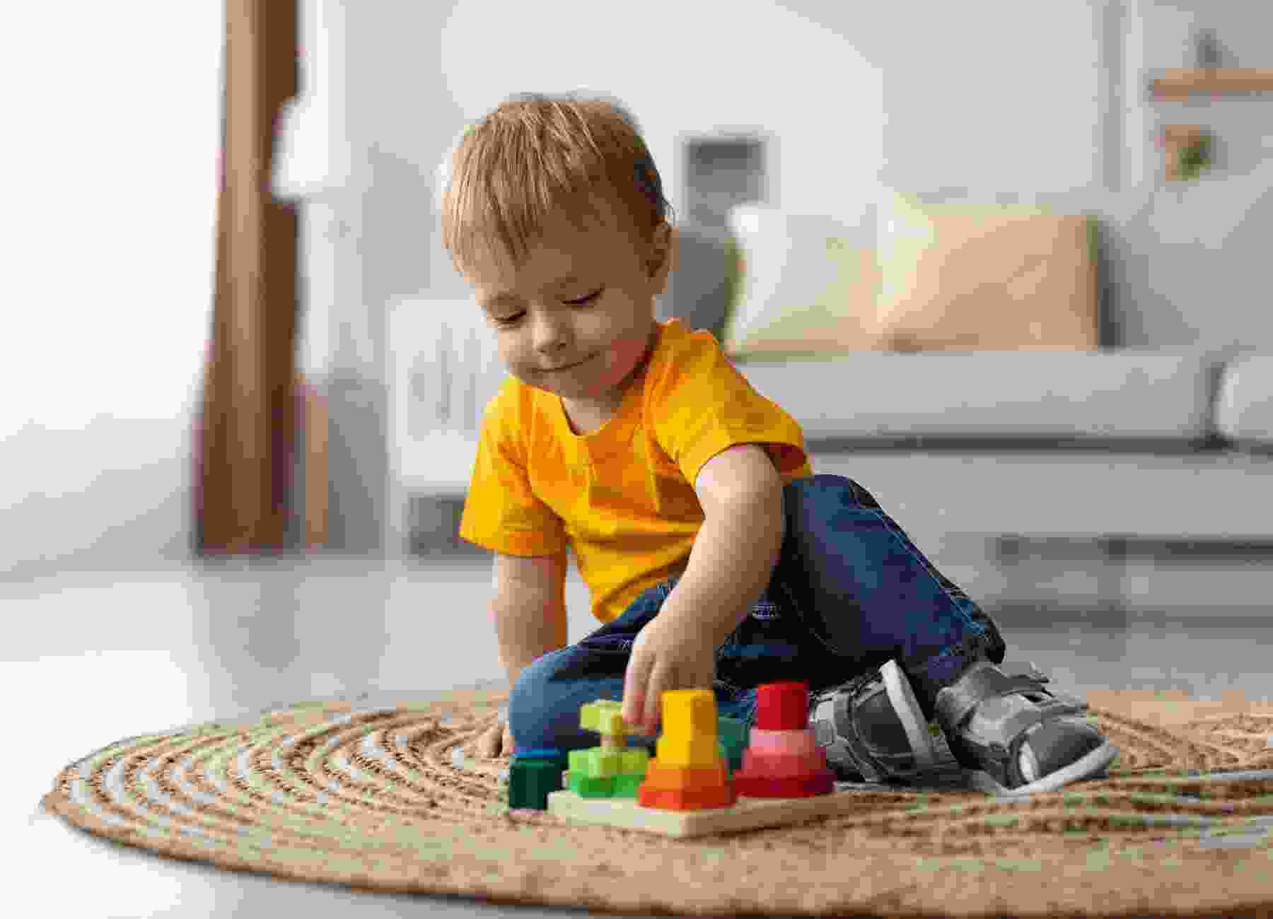 Child playing with learning toys